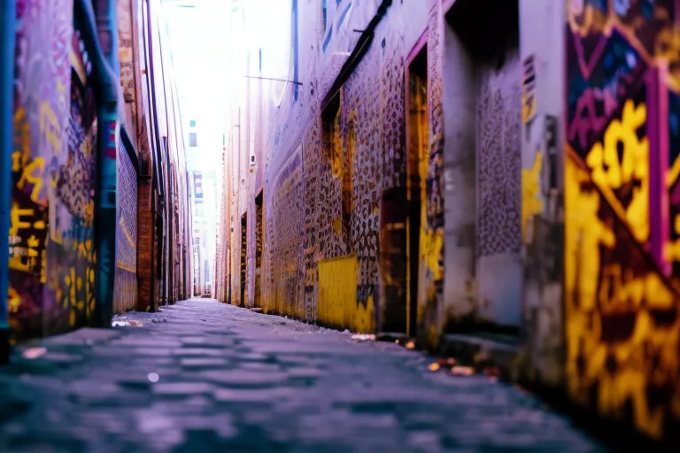 A vibrant patterned alleyway with pops of colorful graffiti and unique architectural details.